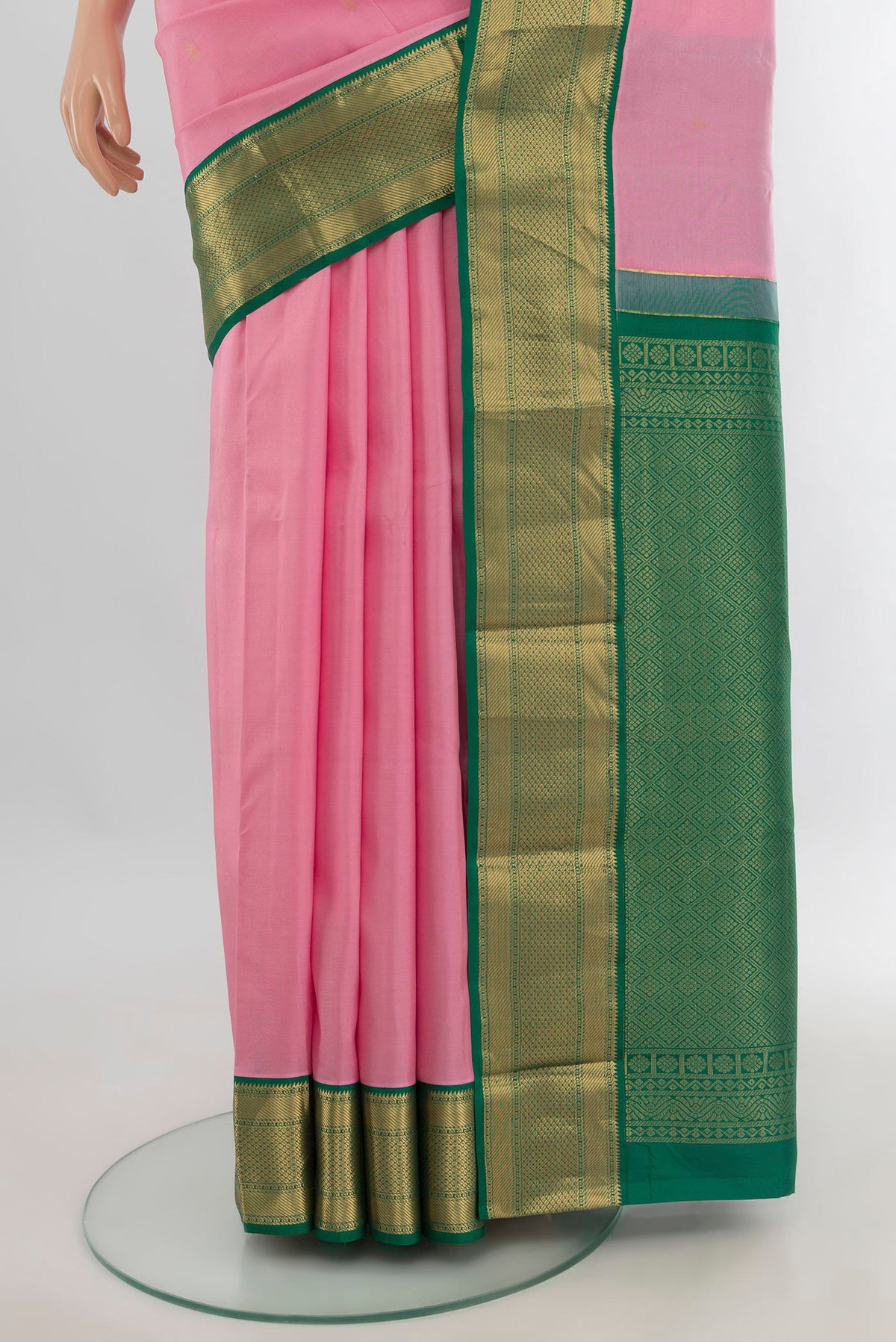 Pleats and pallu of Pure Silk Rose pink Kanjivaram Saree with Zari Butta on the body and Zari Border. 