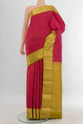 Pure Silk Red Kanjivaram Saree with Zari Butta on the body and Zari Border.  displayed on a mannequin