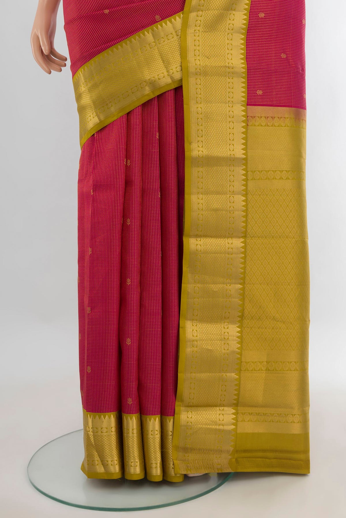 Pleats and pallu of Pure Silk Red Kanjivaram Saree with Zari Butta on the body and Zari Border. 