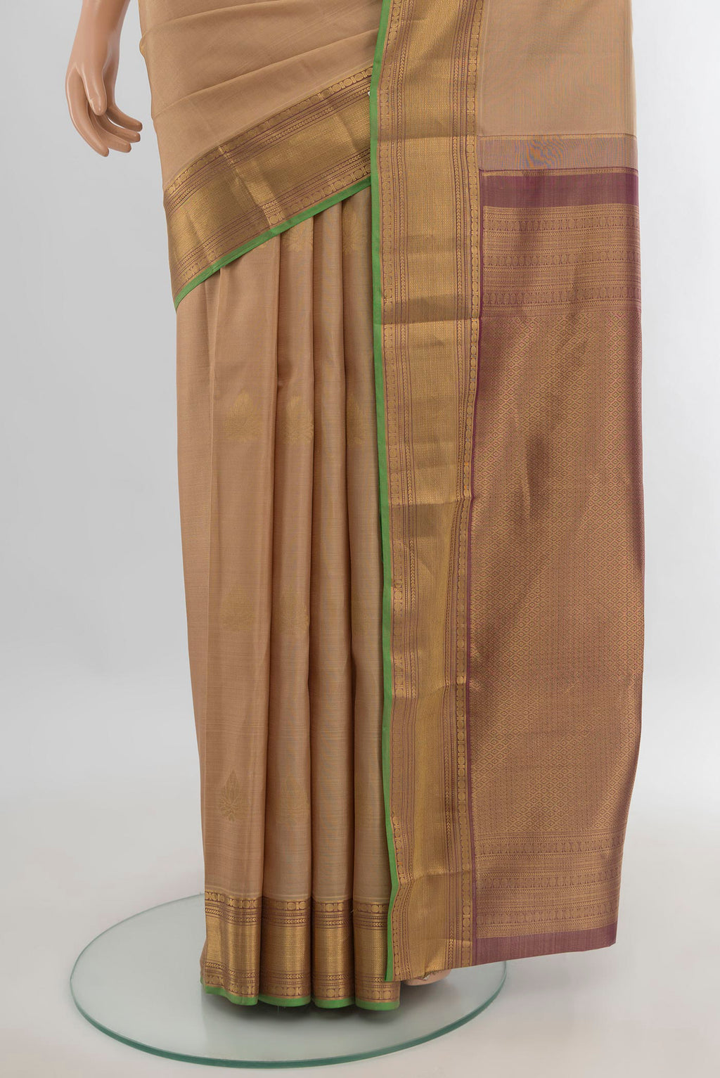 Pleats and pallu of Pure Silk Dark Beige Kanchipuram Saree with Zari Butta on the body and Zari Border. 