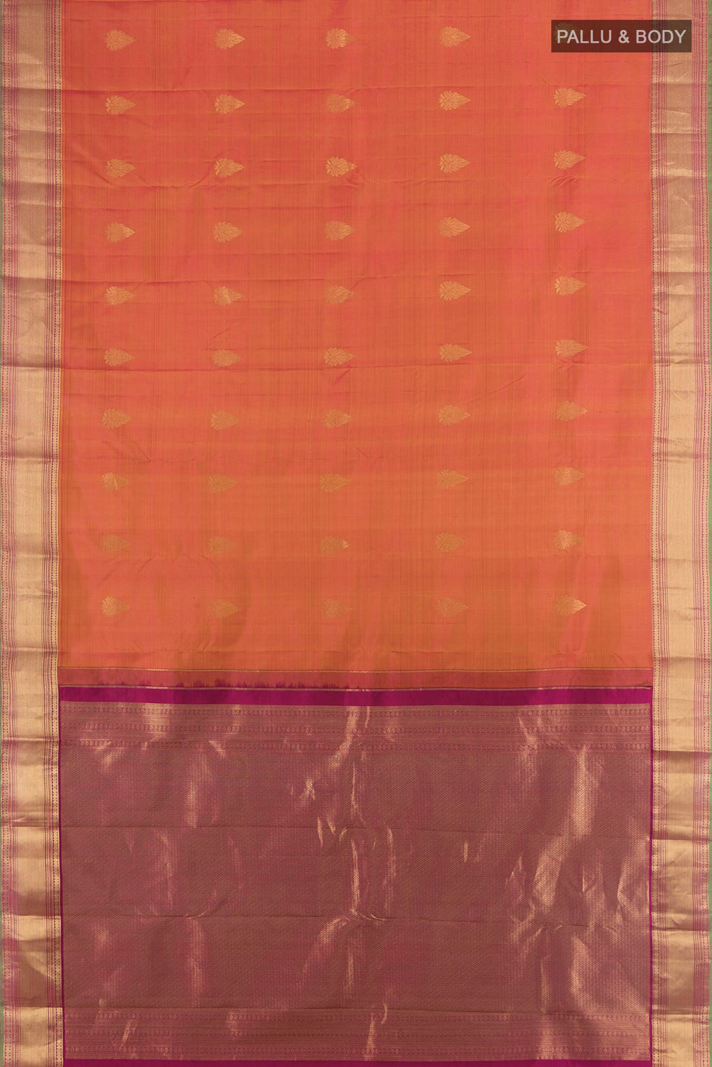 Flat view of Pure Silk Rust Kanchipuram Saree with Zari Butta on the body and Zari Border. 