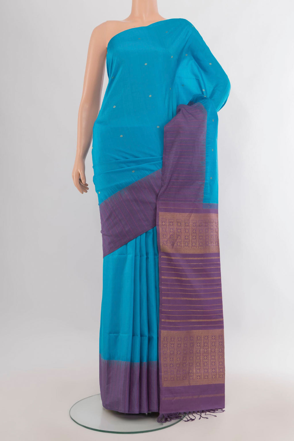 Pure Silk Light Blue Soft Saree with Zari Butta on the body and Plain Border.  displayed on a mannequin