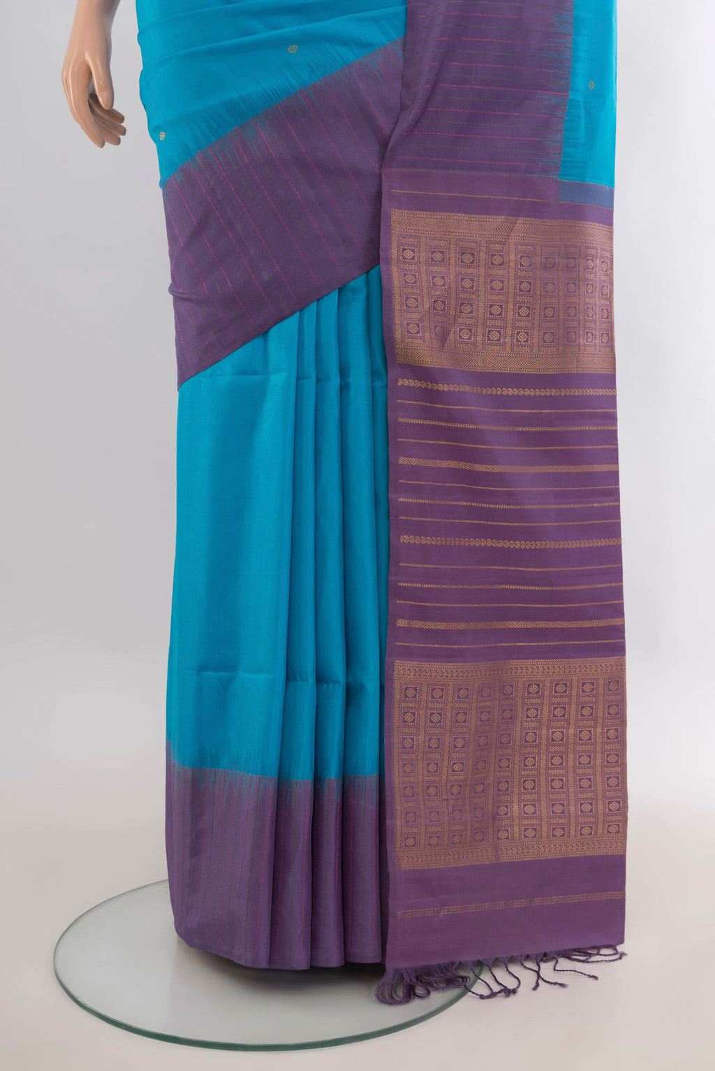 Pleats and pallu of Pure Silk Light Blue Soft Saree with Zari Butta on the body and Plain Border. 