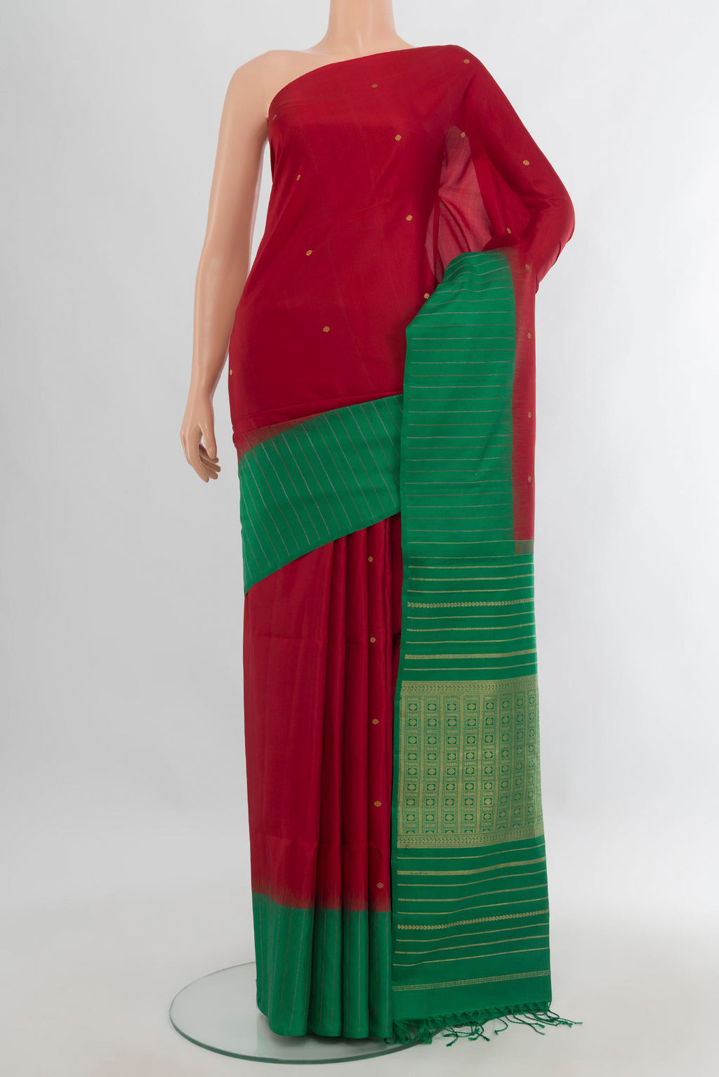 Pure Silk Red Soft Saree with Zari Butta on the body and One Side Border.  displayed on a mannequin