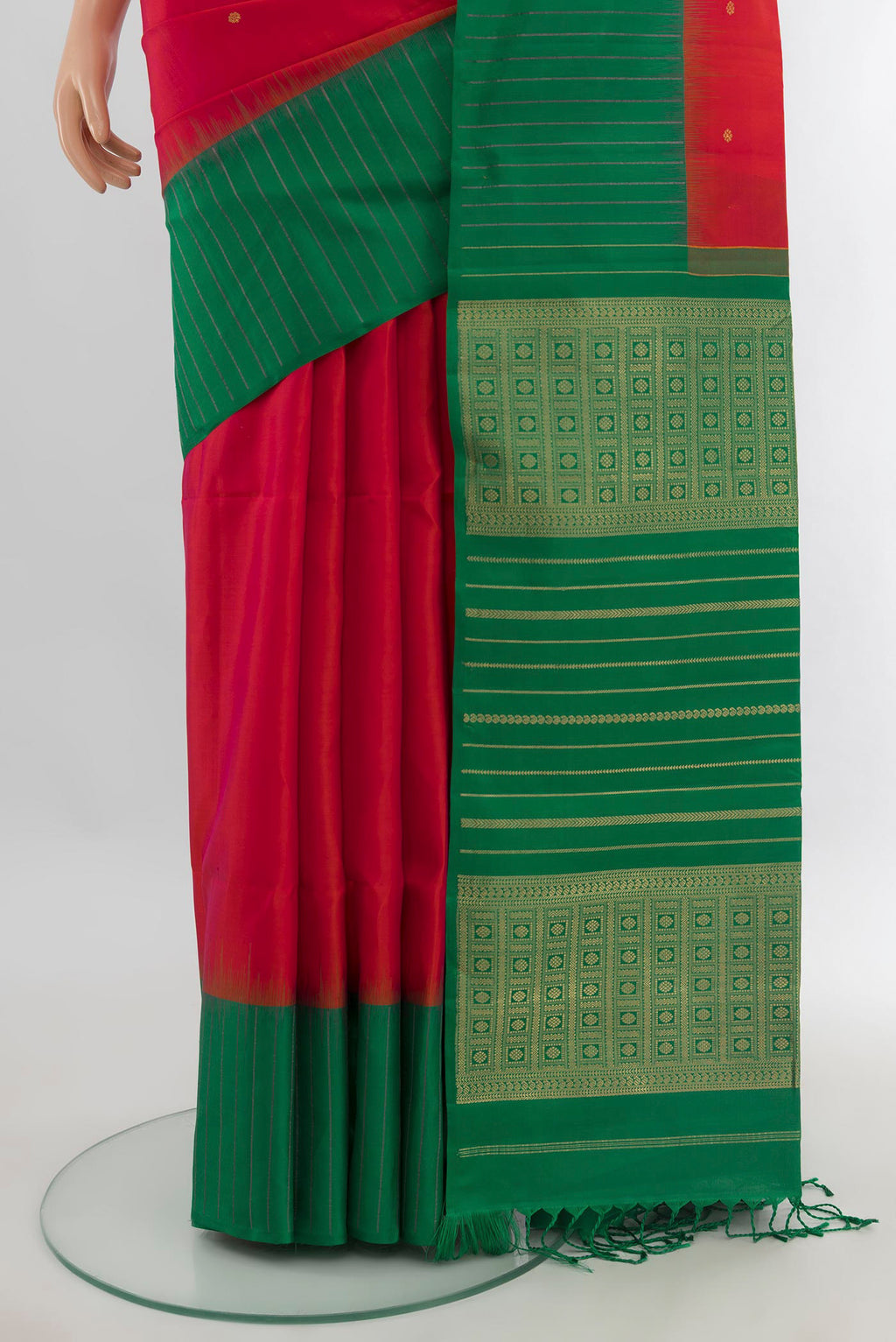 Pleats and pallu of Pure Silk Red Soft Saree with Zari Butta on the body and One Side Border. 