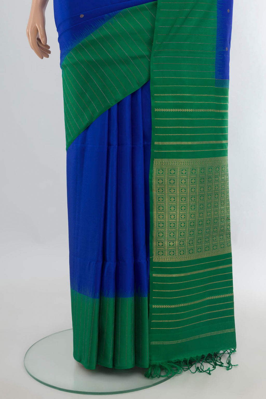 Pleats and pallu of Pure Silk Royal Blue Soft Saree with Zari Butta on the body and One Side Border. 