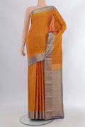 Pure Silk Mustard Kanchipuram Saree with Checked design on the body and Zari Border.  displayed on a mannequin