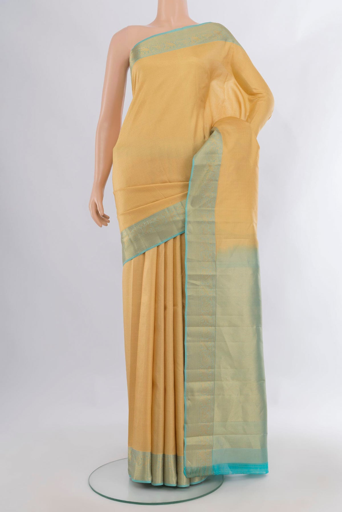 Pure Silk Sandal Kanchipuram Saree with Checked design on the body and Zari Border.  displayed on a mannequin