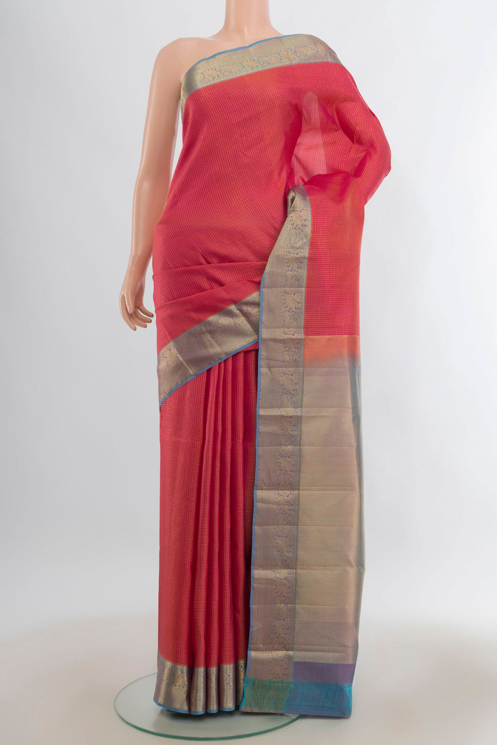 Pure Silk Pink Kanchipuram Saree with Checked design on the body and Zari Border.  displayed on a mannequin