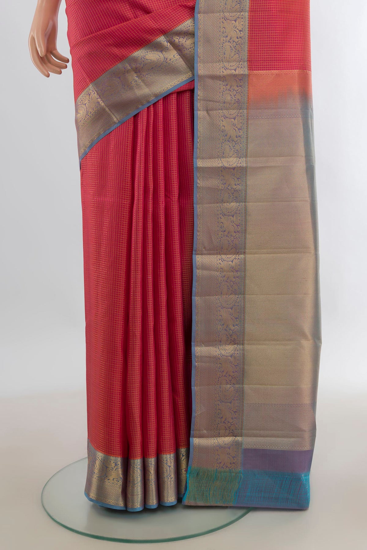 Pleats and pallu of Pure Silk Pink Kanchipuram Saree with Checked design on the body and Zari Border. 