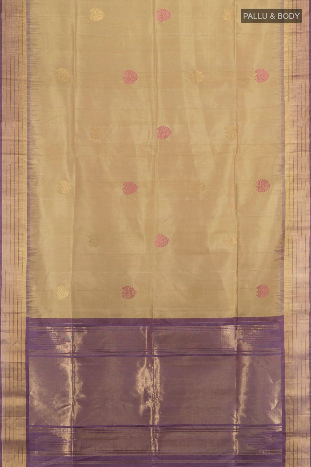 Flat view of Pure Silk Beige Soft Saree with Zari Butta on the body and Zari Border. 