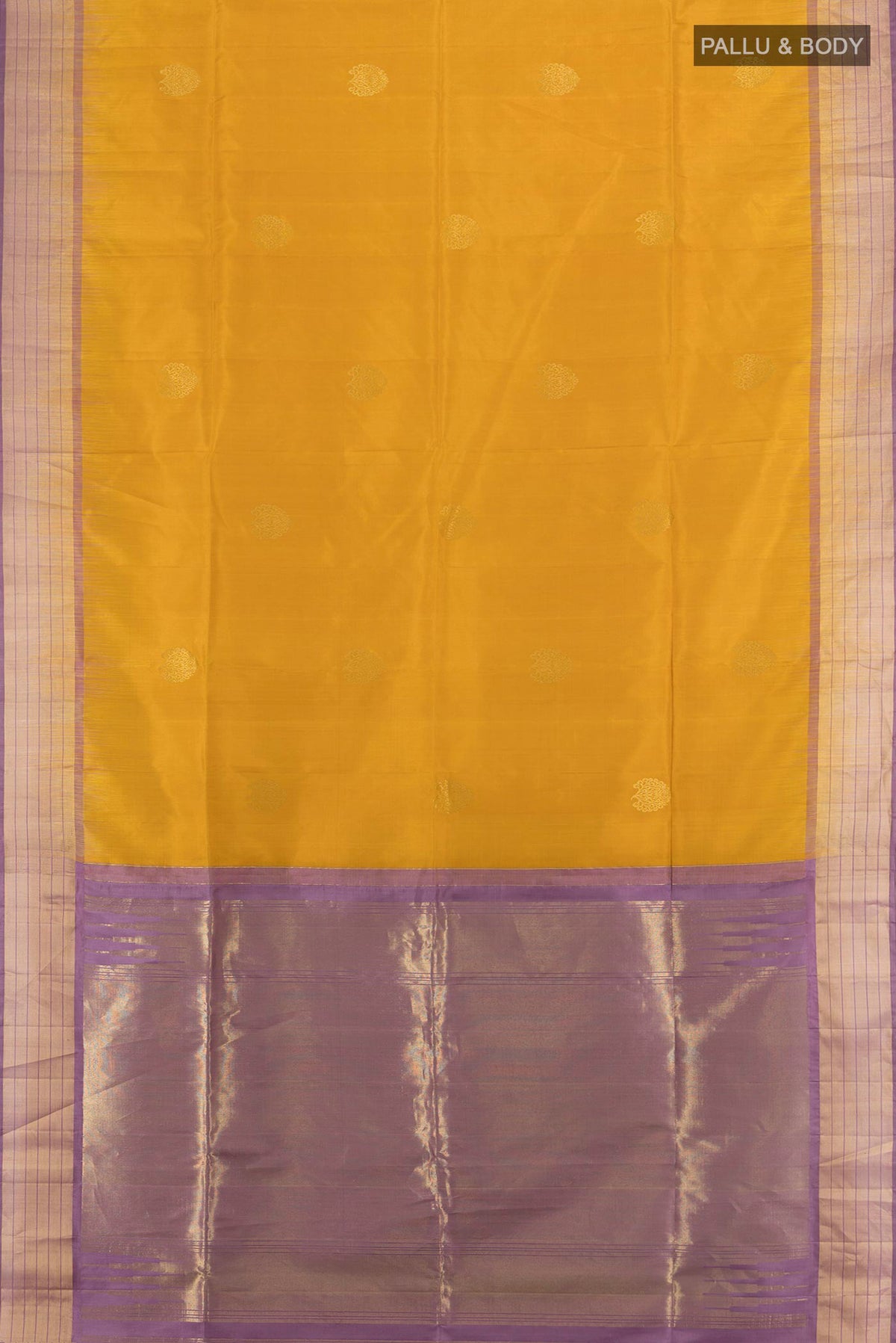 Flat view of Pure Silk Mustard Soft Saree with Zari Butta on the body and Zari Border. 