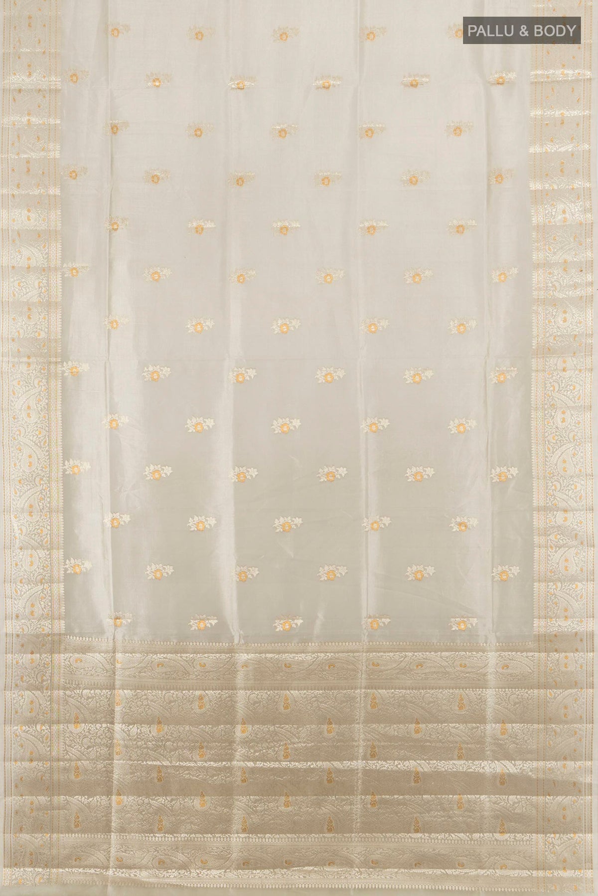 Flat view of Pure Silk Beige Banarasi Raw Saree with Zari Butta on the body and Zari Border. 