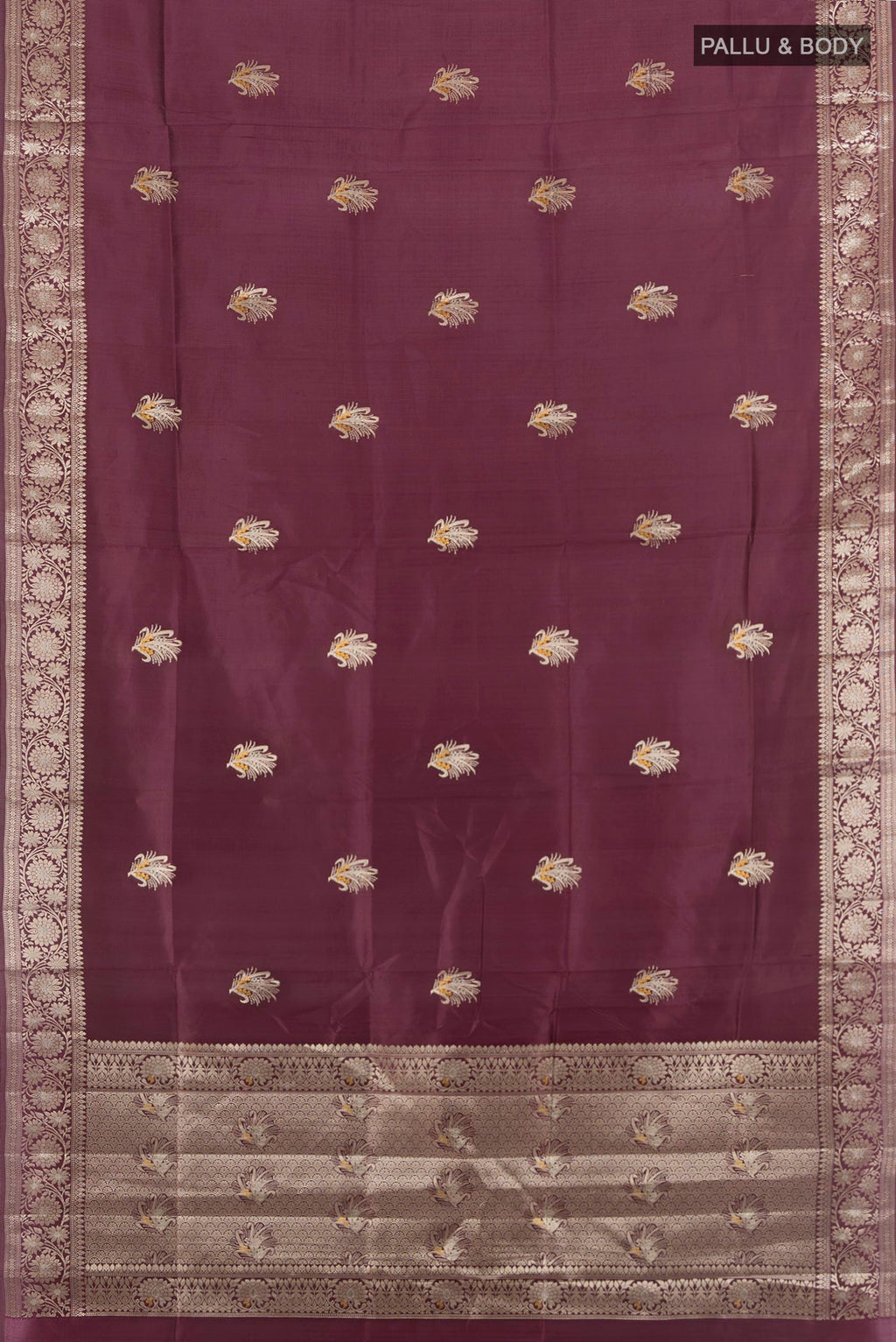 Flat view of Pure Silk Coffee Brown Banarasi Raw Saree with Zari Butta on the body and Zari Border. 