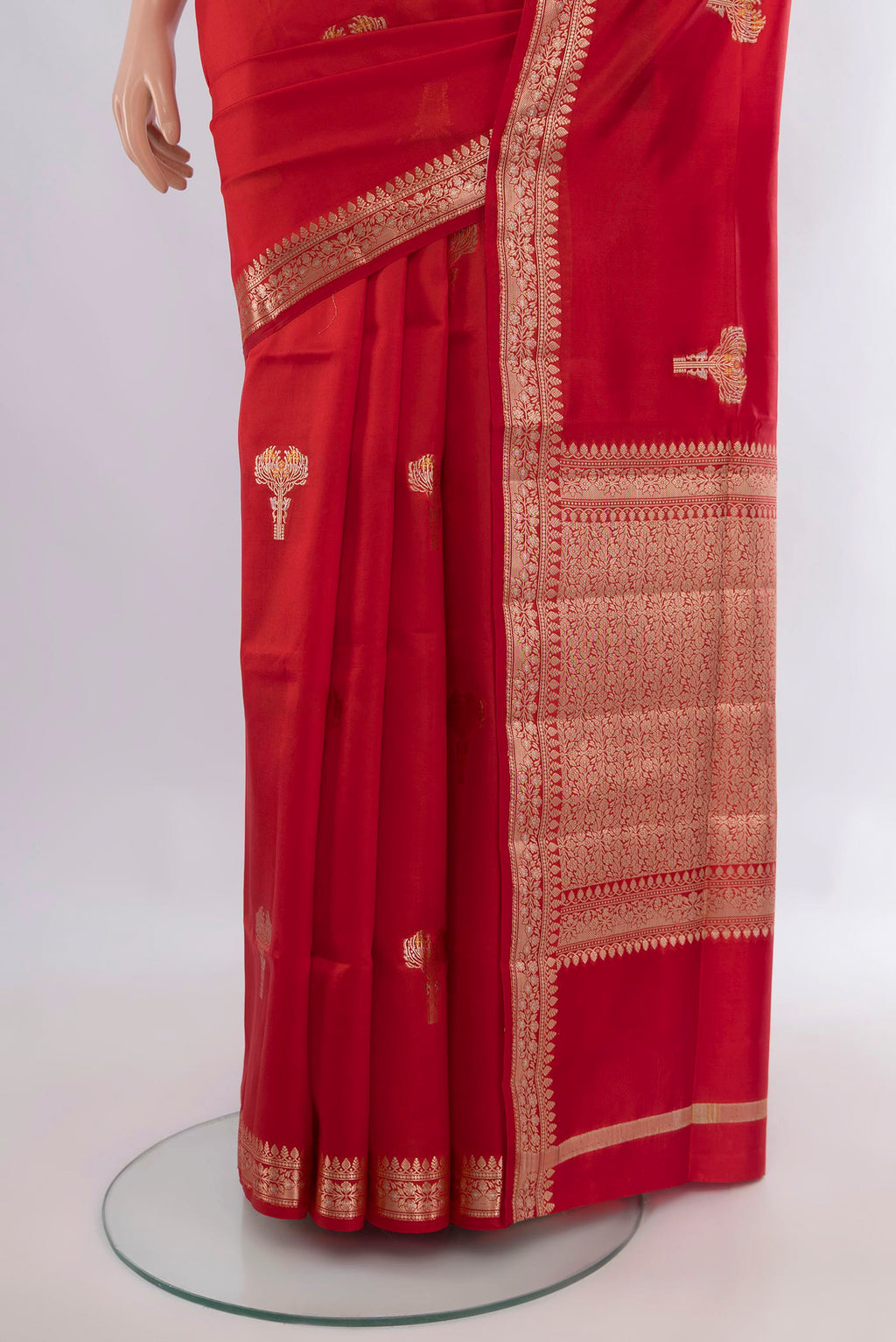 Pleats and pallu of Pure Silk Red Banarasi Raw Saree with Zari Butta on the body and Zari Border. 