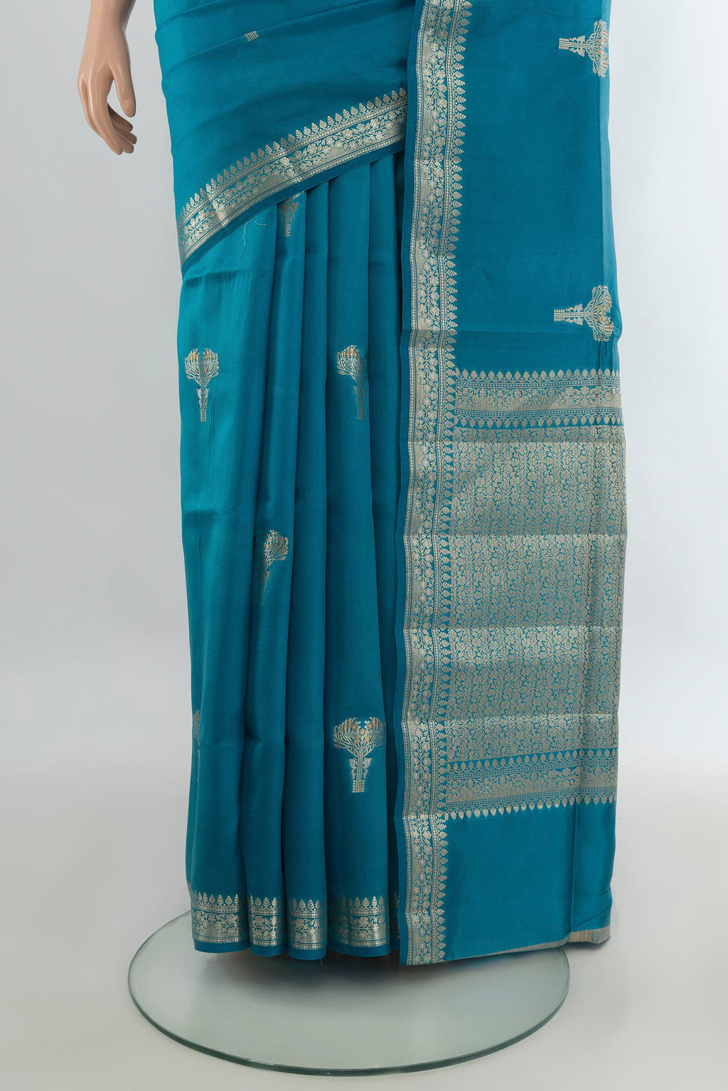 Pleats and pallu of Pure Silk Light Blue Banarasi Raw Saree with Zari Butta on the body and Zari Border. 
