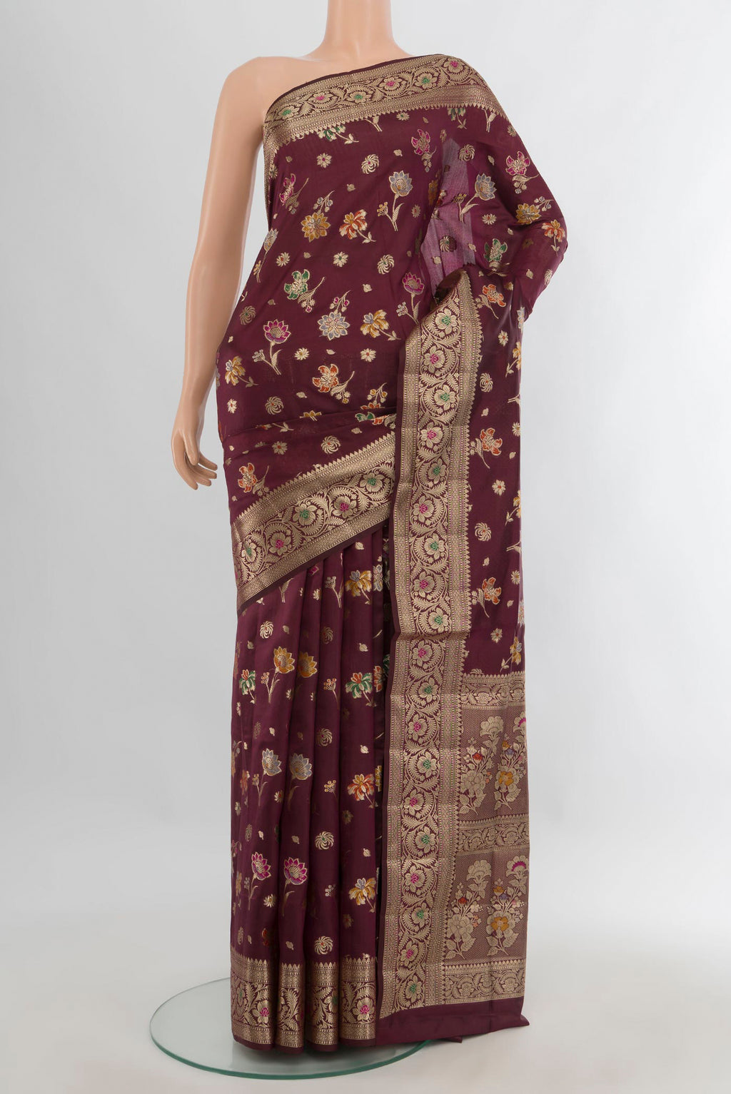 Pure Silk Coffee Brown Banarasi Raw Saree with Zari And Thread Butta on the body and Zari Border.  displayed on a mannequin