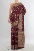 Pure Silk Coffee Brown Banarasi Raw Saree with Zari And Thread Butta on the body and Zari Border.  displayed on a mannequin