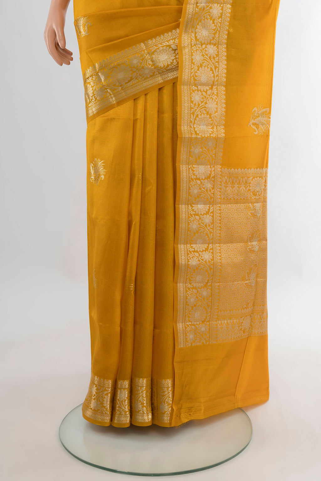Pleats and pallu of Pure Silk Yellow Banarasi Raw Saree with Zari Butta on the body and Zari Border. 