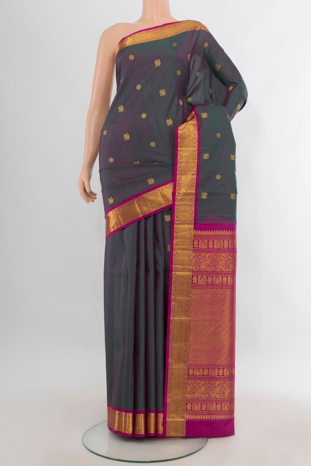Pure Silk Green with Pink Color Kanjivaram Saree with Zari Butta on the body and Zari Border.  displayed on a mannequin