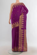 Pure Silk Violet Kanchipuram Saree with Zari Butta on the body and Silk Border.  displayed on a mannequin