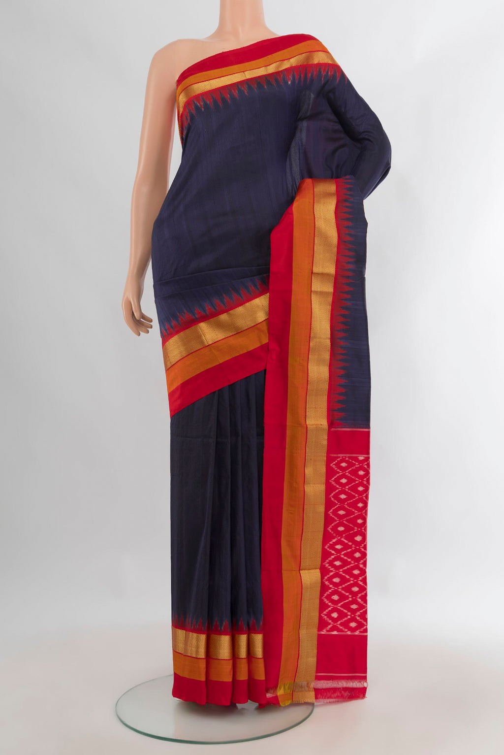 Pure Silk Navy Blue Pochampally Saree with Plain Body and Zari Border.  displayed on a mannequin
