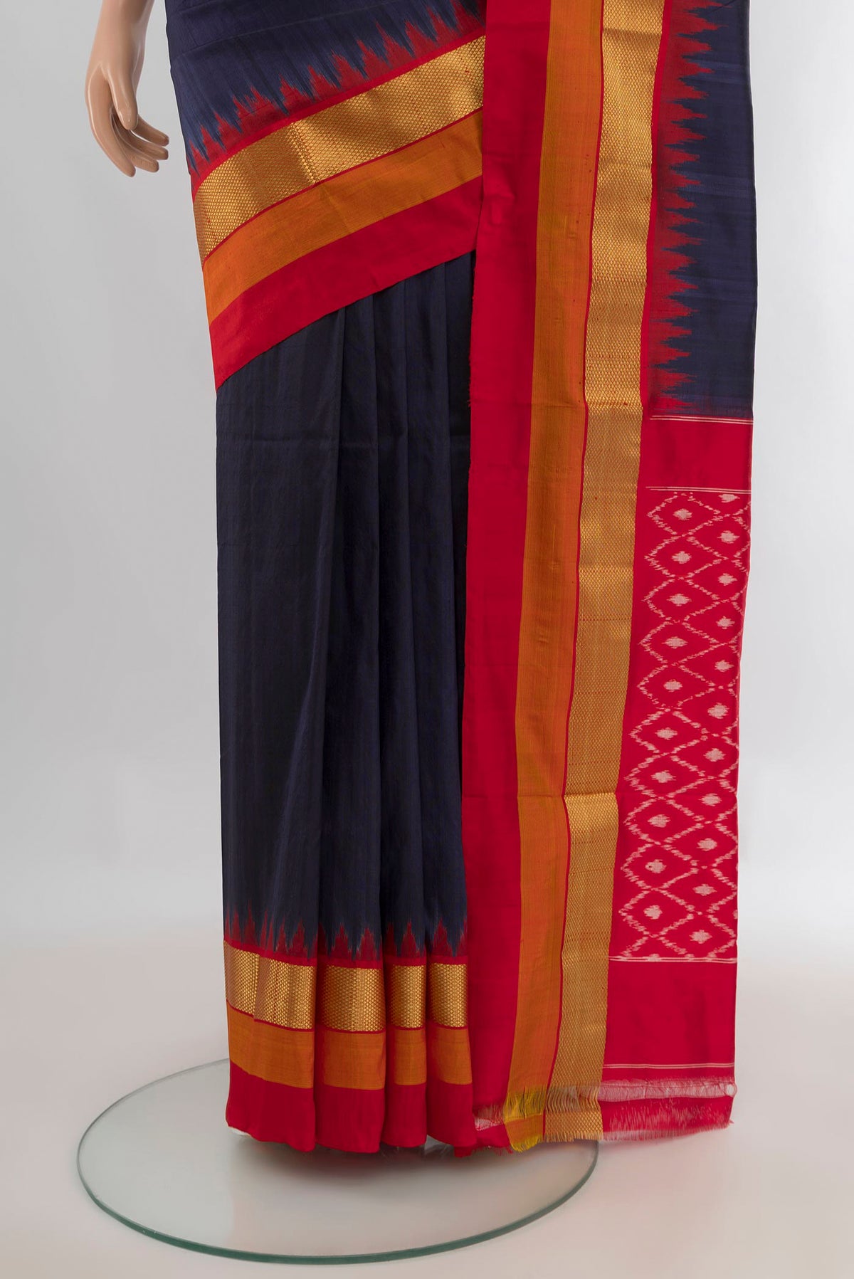 Pleats and pallu of Pure Silk Navy Blue Pochampally Saree with Plain Body and Zari Border. 