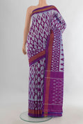 Pure Silk Grey Pochampally Saree with Pure Ikat on the body and Zari Border.  displayed on a mannequin