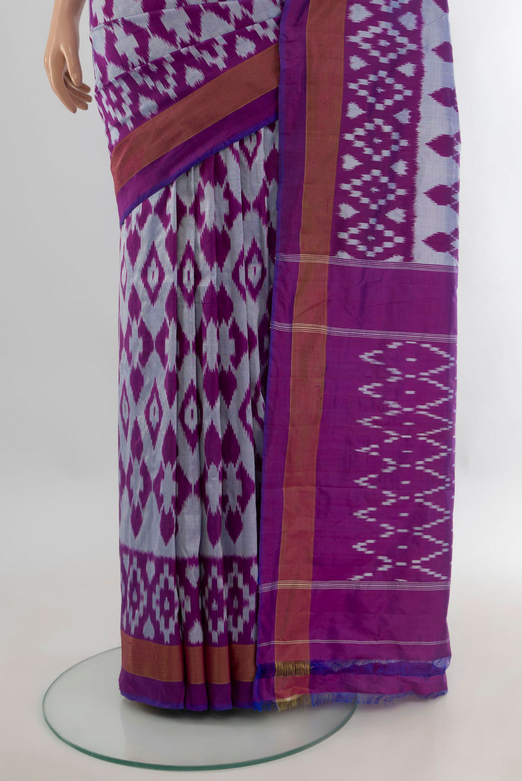 Pleats and pallu of Pure Silk Grey Pochampally Saree with Pure Ikat on the body and Zari Border. 