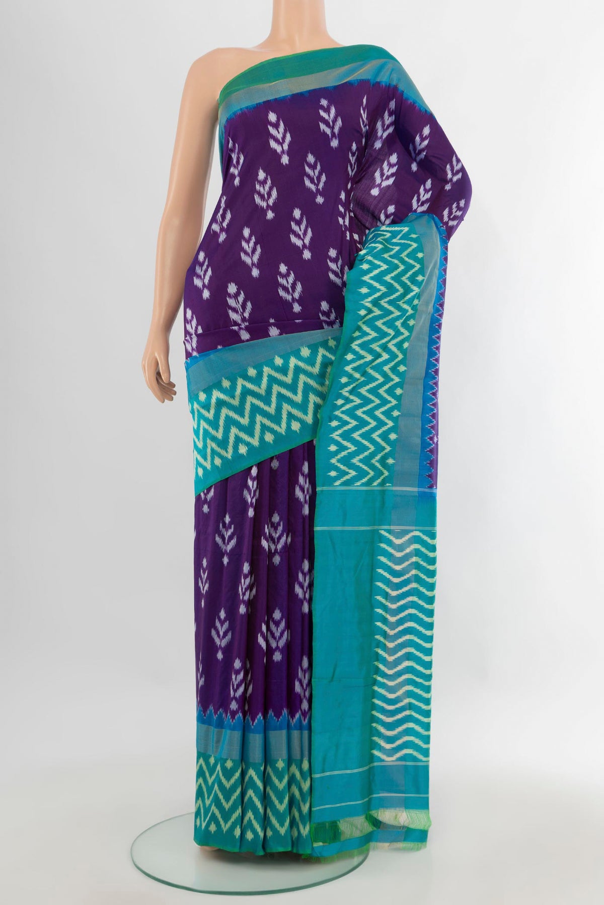 Pure Silk Violet Pochampally Saree with Pure Ikat on the body and Ikat Border.  displayed on a mannequin
