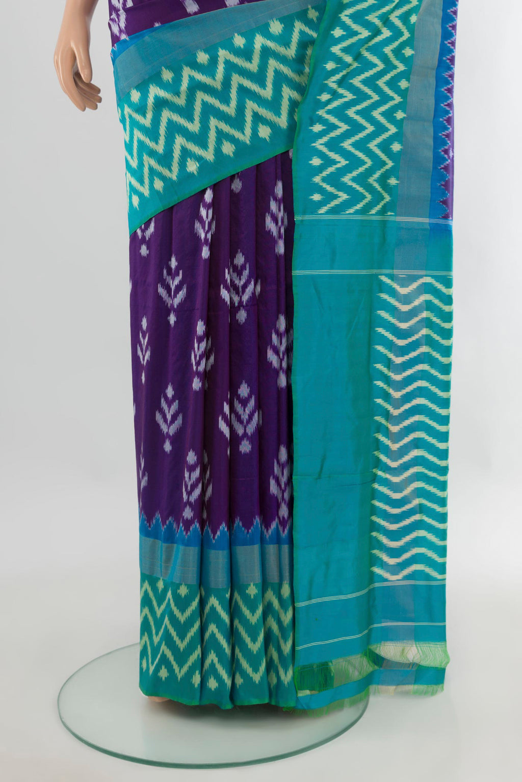 Pleats and pallu of Pure Silk Violet Pochampally Saree with Pure Ikat on the body and Ikat Border. 