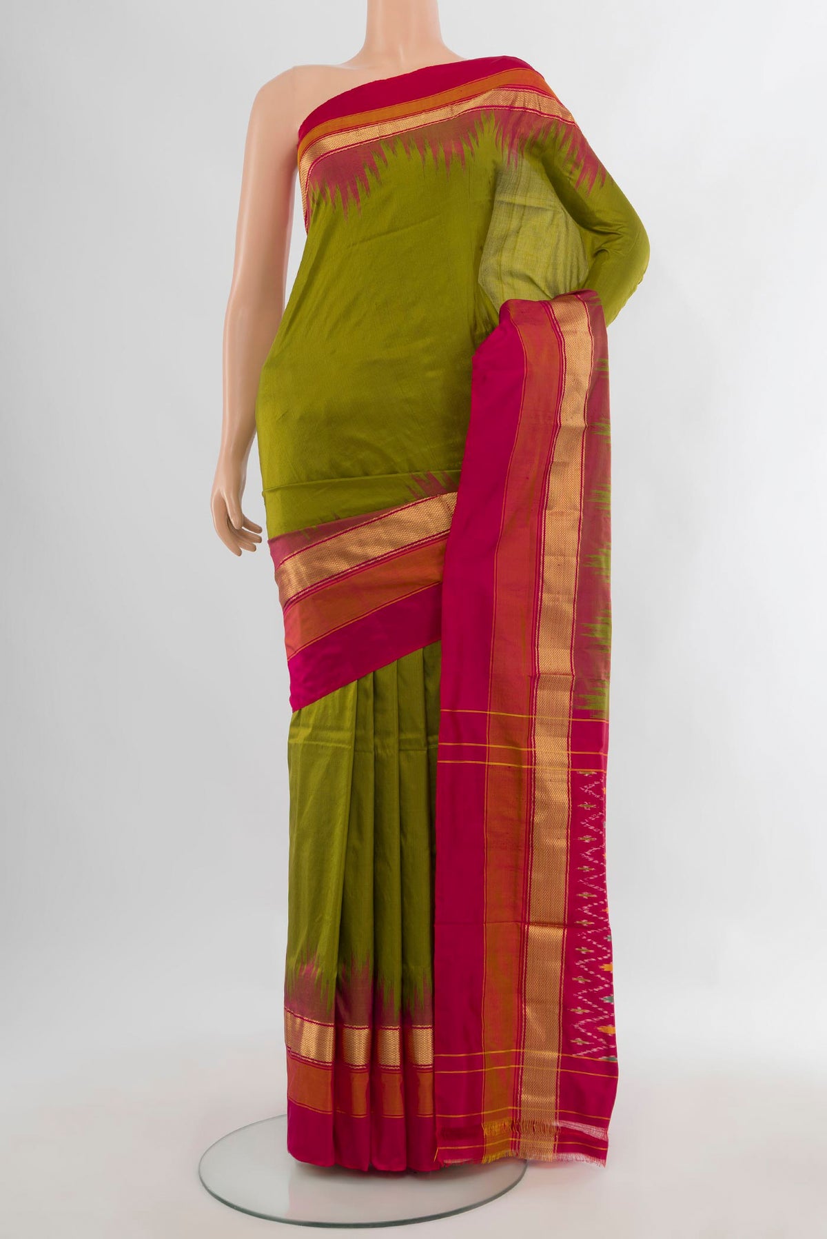 Pure Silk Mehandi Green Pochampally Saree with Plain Body and Zari Border.  displayed on a mannequin