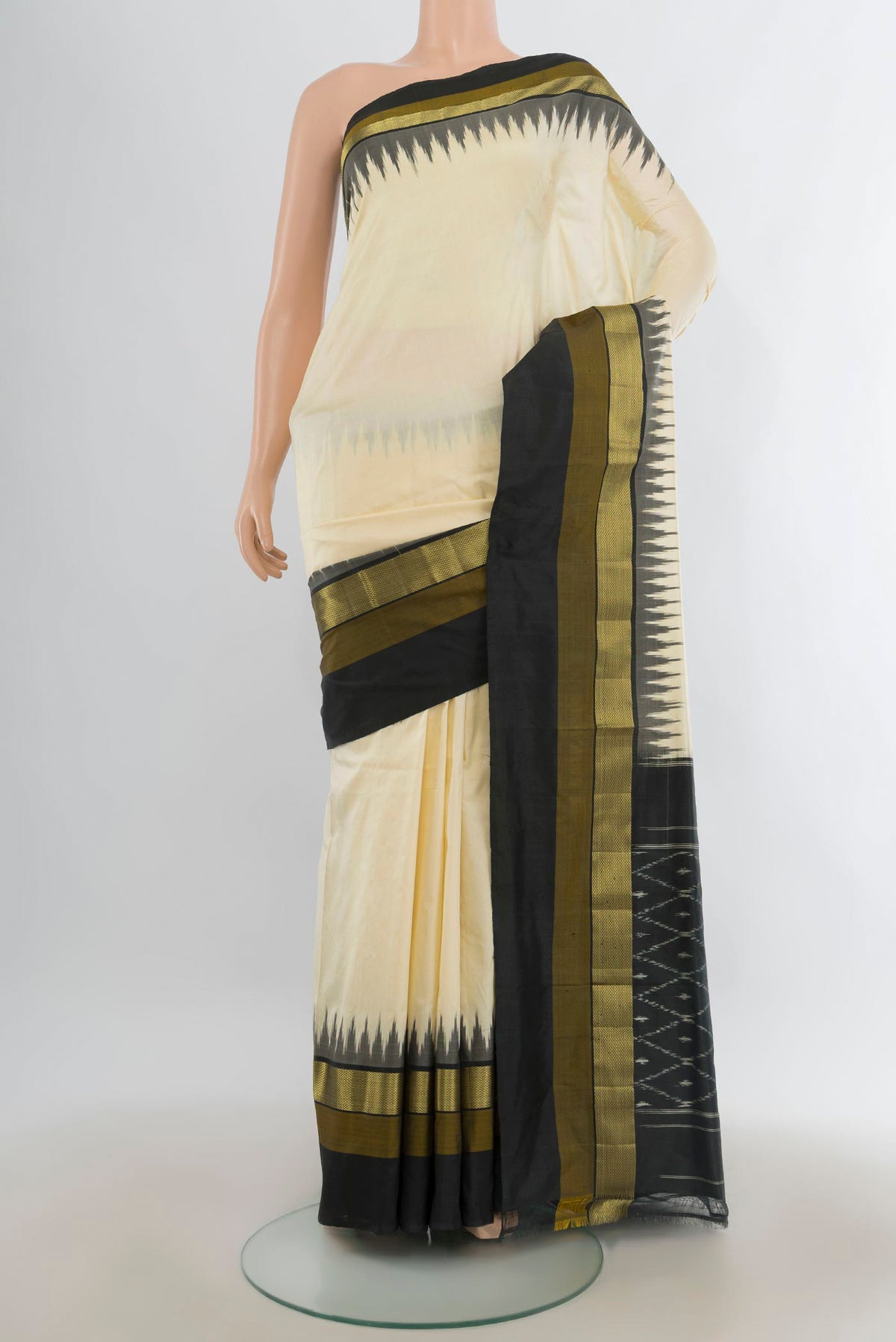 Pure Silk Cream Pochampally Saree with Plain Body and Zari Border.  displayed on a mannequin