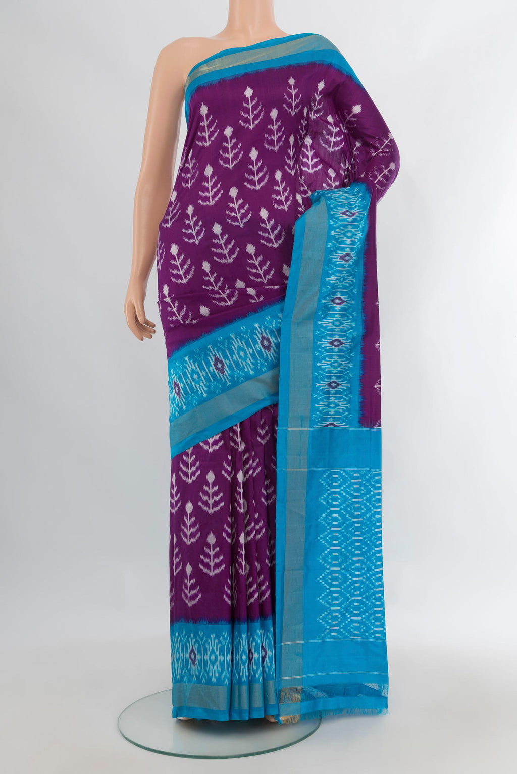 Pure Silk Violet Pochampally Saree with Pure Ikat on the body and Ikat Border.  displayed on a mannequin