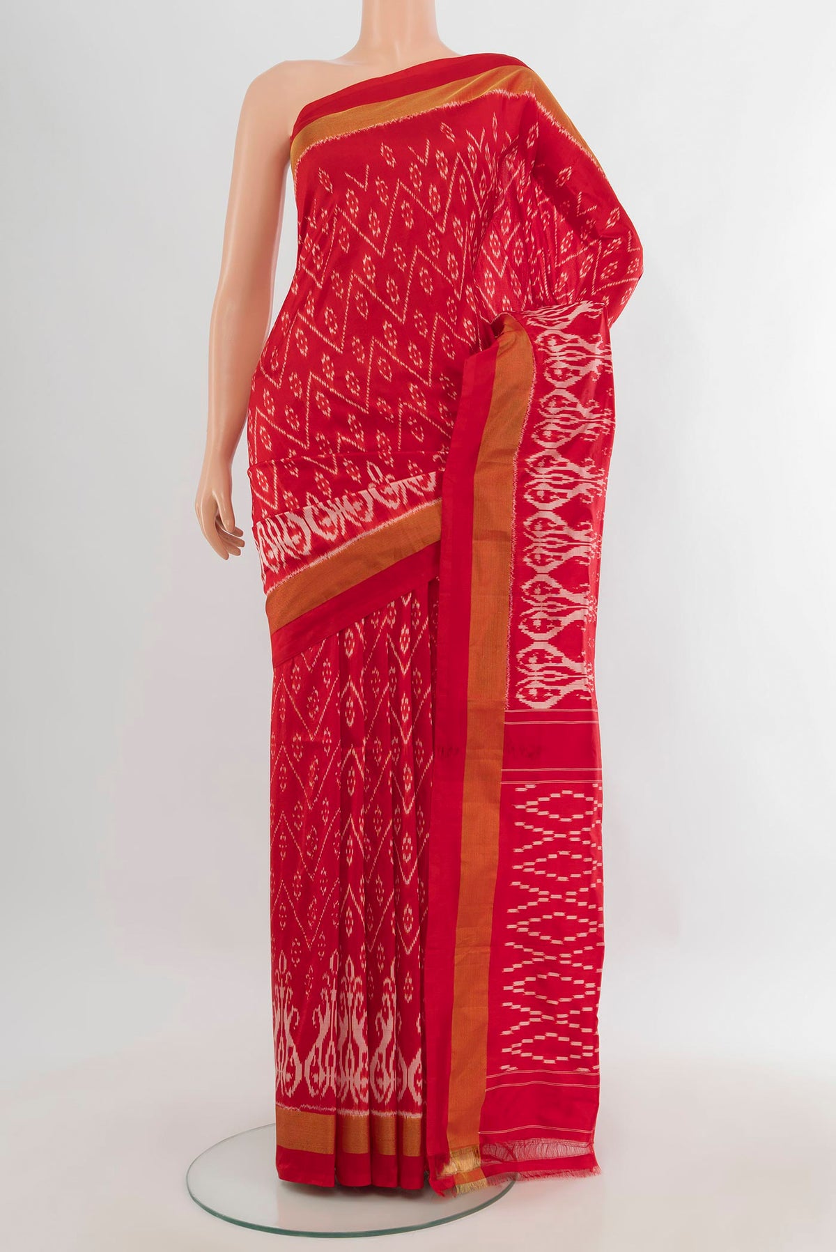 Pure Silk Red Pochampally Saree with Pure Ikat on the body and Zari Border.  displayed on a mannequin