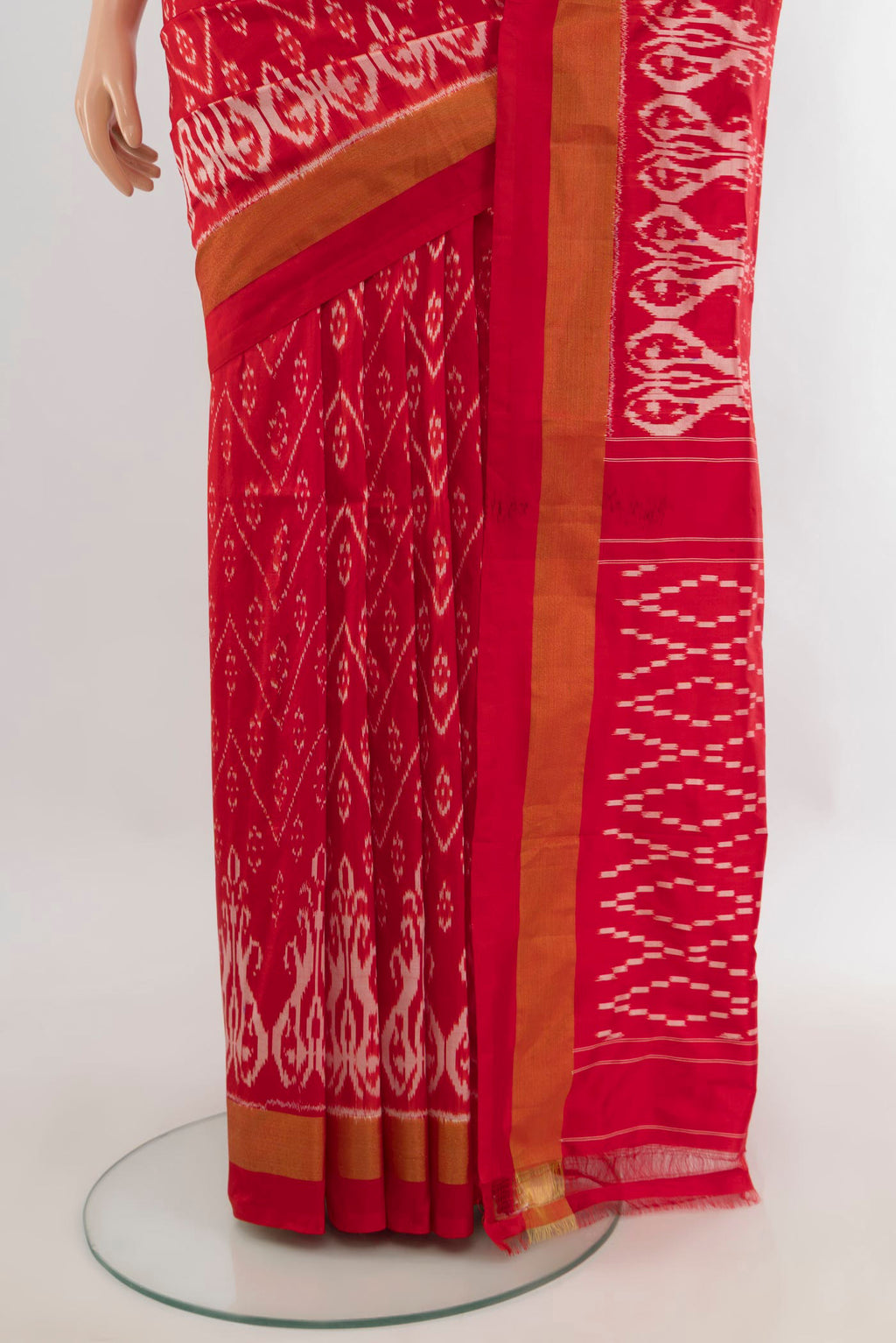 Pleats and pallu of Pure Silk Red Pochampally Saree with Pure Ikat on the body and Zari Border. 