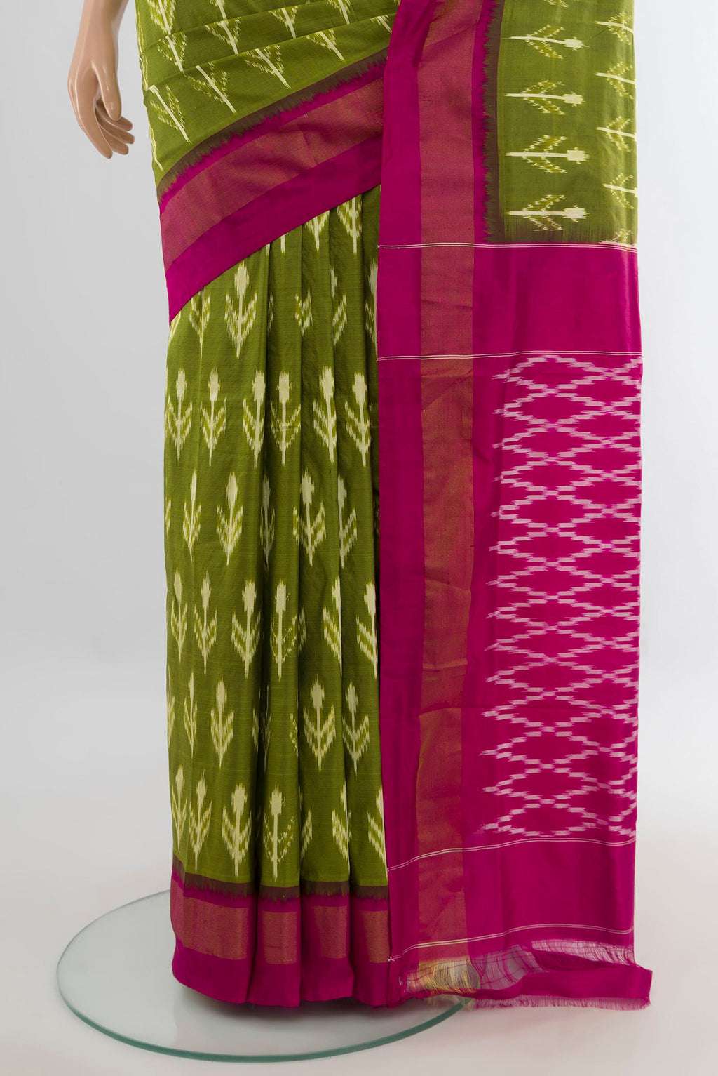 Pleats and pallu of Pure Silk Green Pochampally Saree with Pure Ikat on the body and Zari Border. 