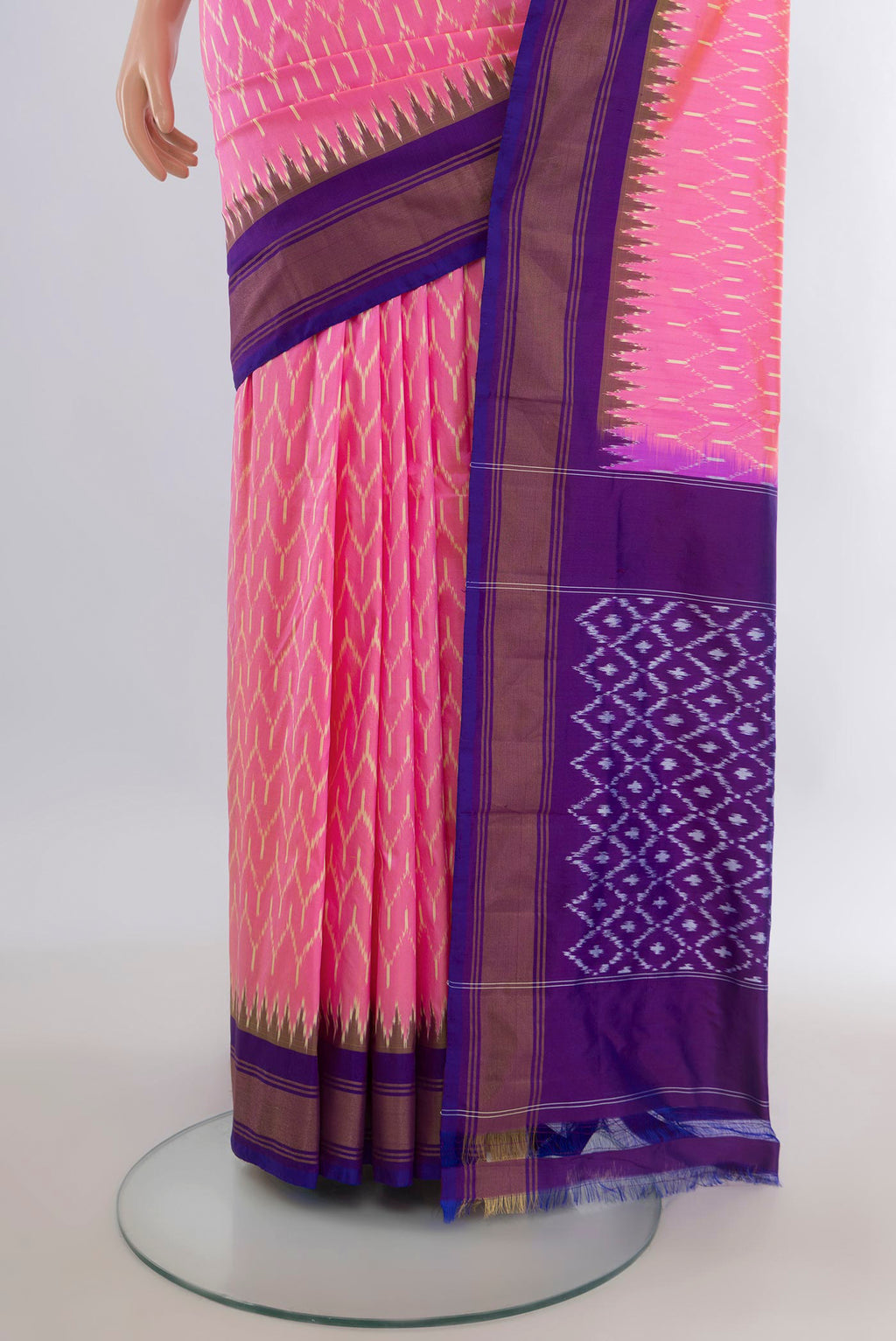 Pleats and pallu of Pure Silk Pink Pochampally Saree with Pure Ikat on the body and Zari Border. 