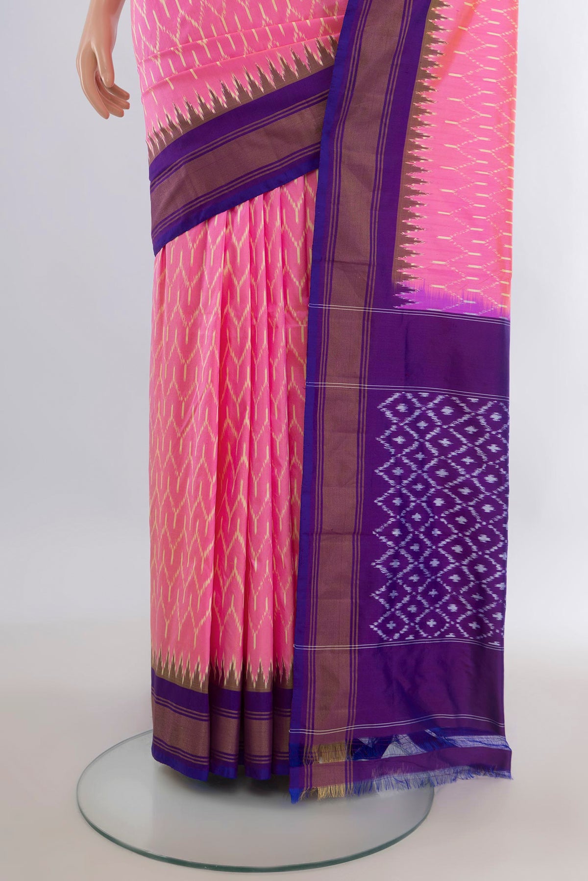 Pleats and pallu of Pure Silk Pink Pochampally Saree with Pure Ikat on the body and Zari Border. 
