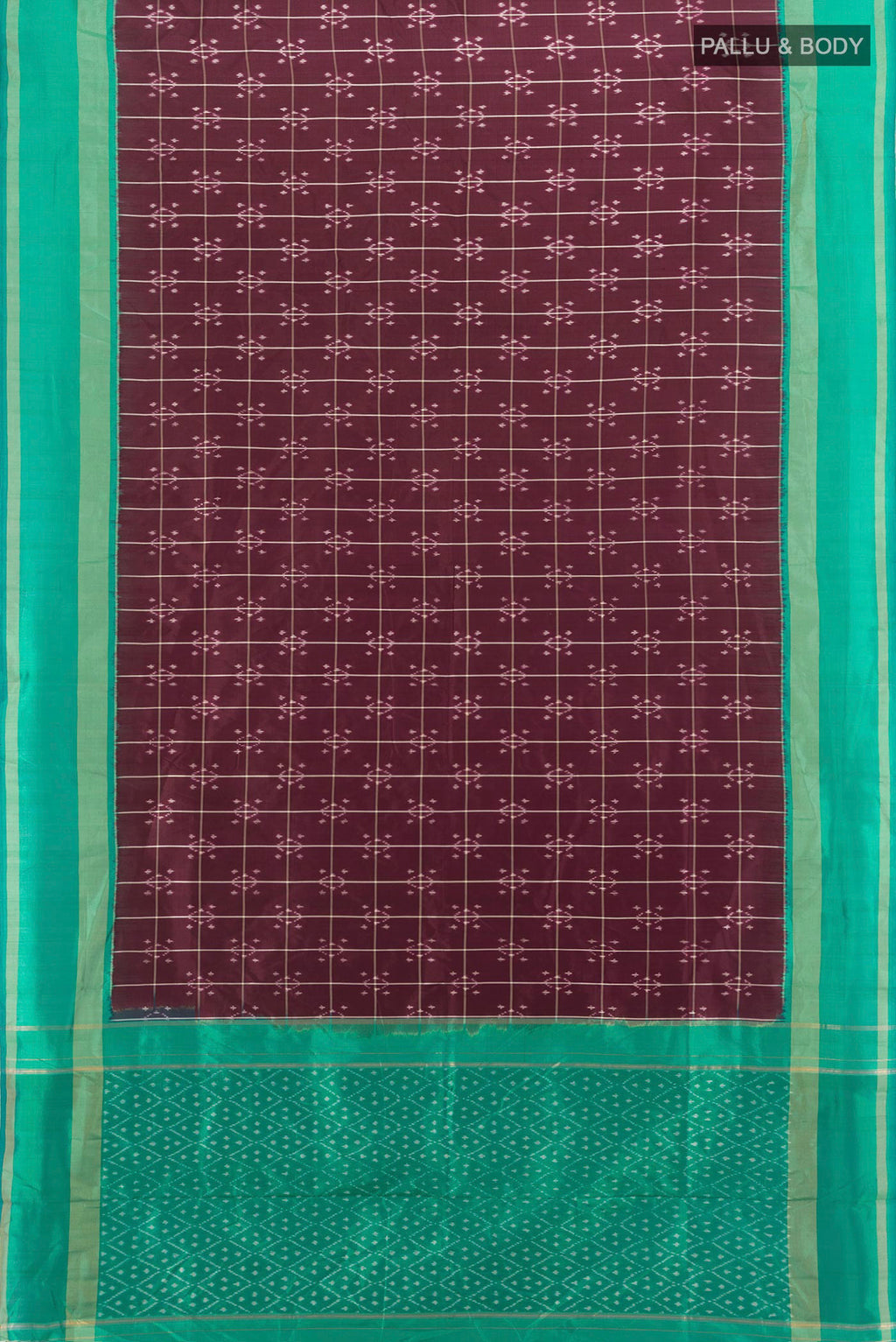 Flat view of Pure Silk Coffee Brown Pochampally Saree with Ikat design on the body and Ikat Border. 