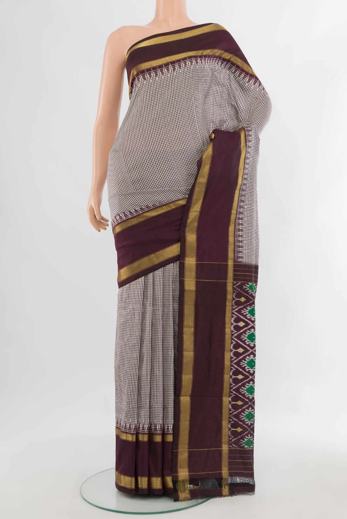 Pure Silk Multi Color Pochampally Saree with Checked design on the body and Zari Border.  displayed on a mannequin