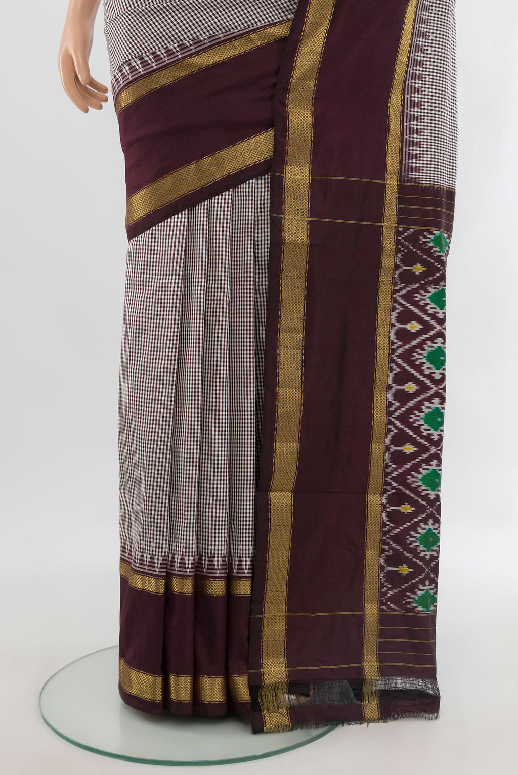 Pleats and pallu of Pure Silk Multi Color Pochampally Saree with Checked design on the body and Zari Border. 