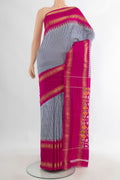 Pure Silk Blue Pochampally Saree with Checked design on the body and Zari Border.  displayed on a mannequin