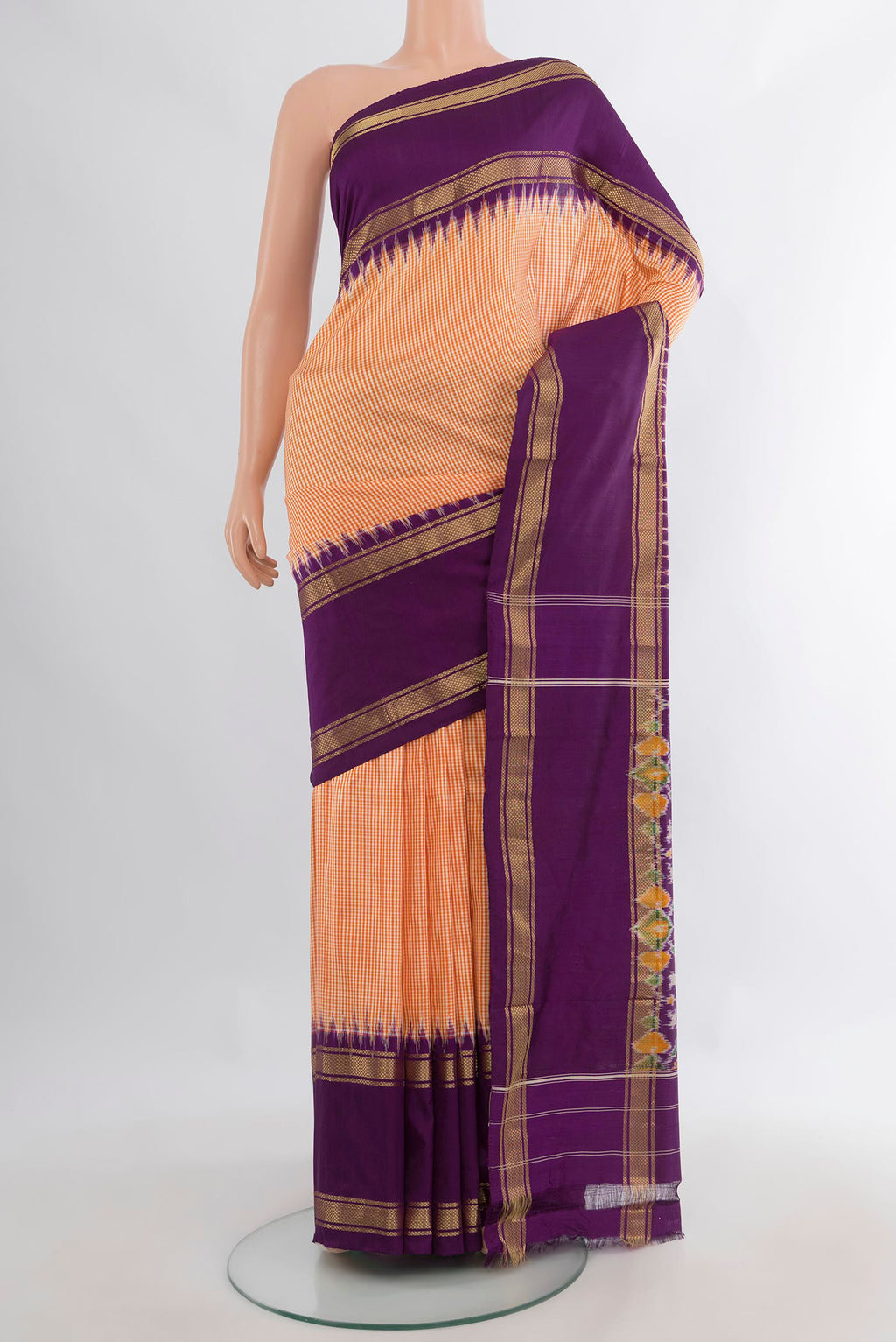 Pure Silk Orange Pochampally Saree with Checked design on the body and Zari Border.  displayed on a mannequin