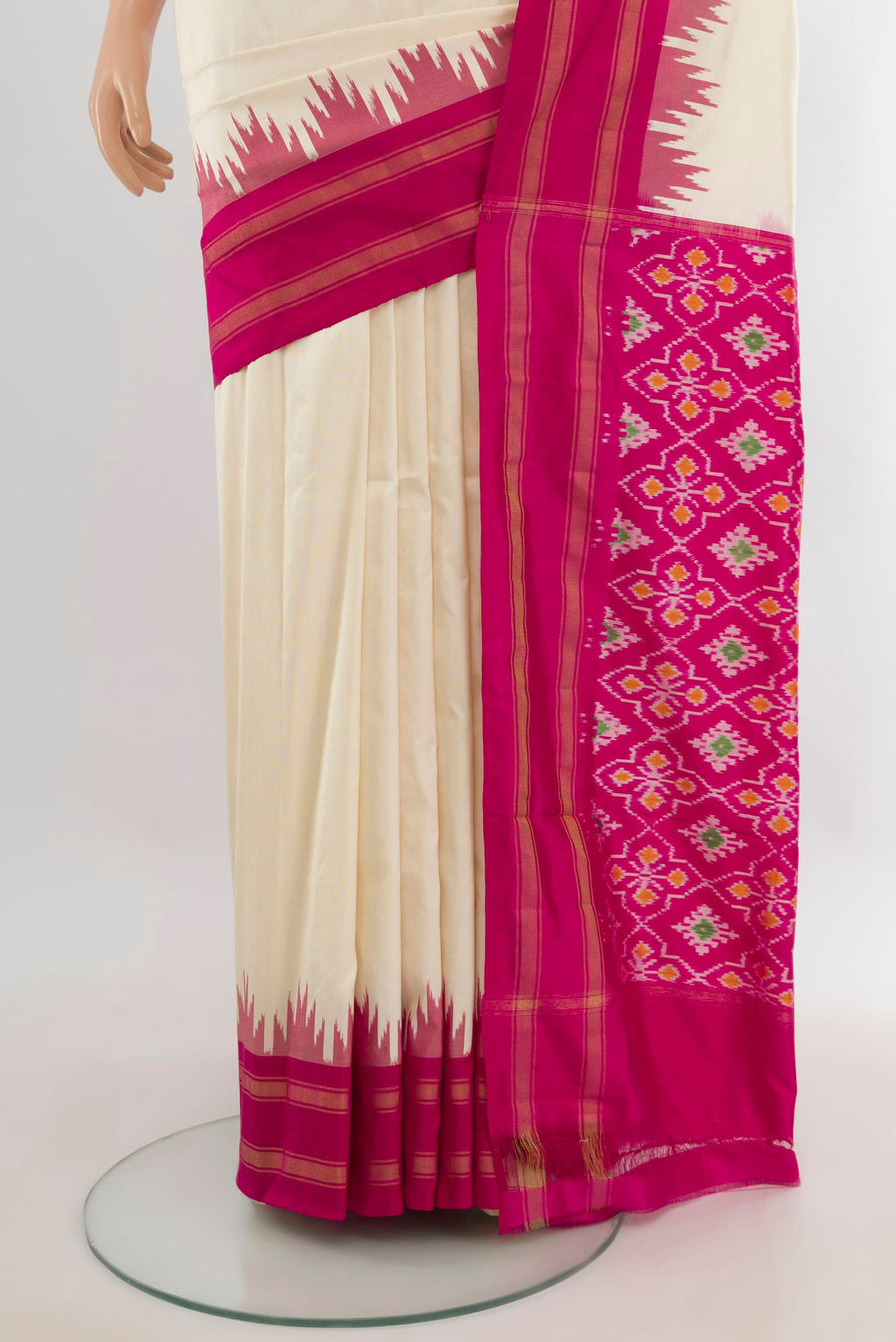 Pleats and pallu of Pure Silk Cream Pochampally Saree with Plain Body and Ganga Jamuna Border. 