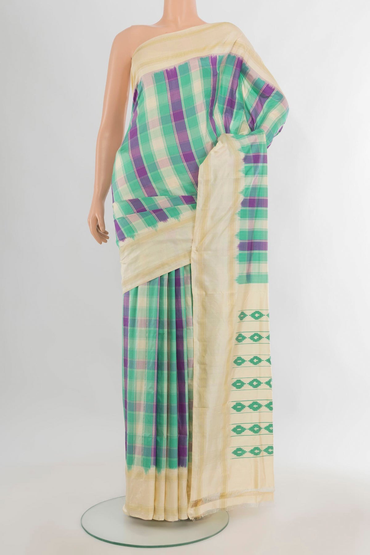 Pure Silk Multi Color Pochampally Saree with Ikat Print on the body and Plain Border.  displayed on a mannequin