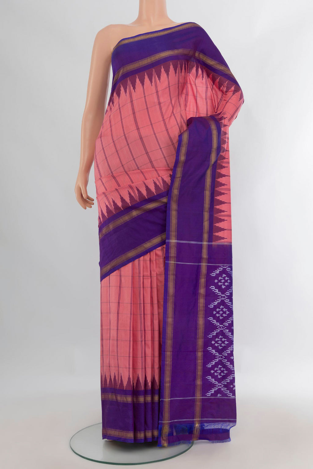 Pure Silk Coral Pochampally Saree with Checked design on the body and Plain Border.  displayed on a mannequin