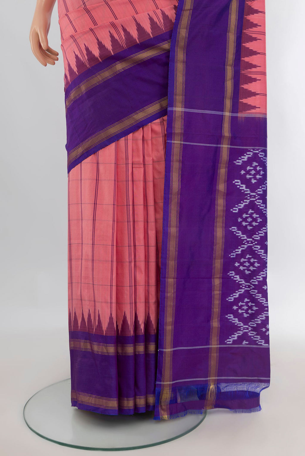 Pleats and pallu of Pure Silk Coral Pochampally Saree with Checked design on the body and Plain Border. 