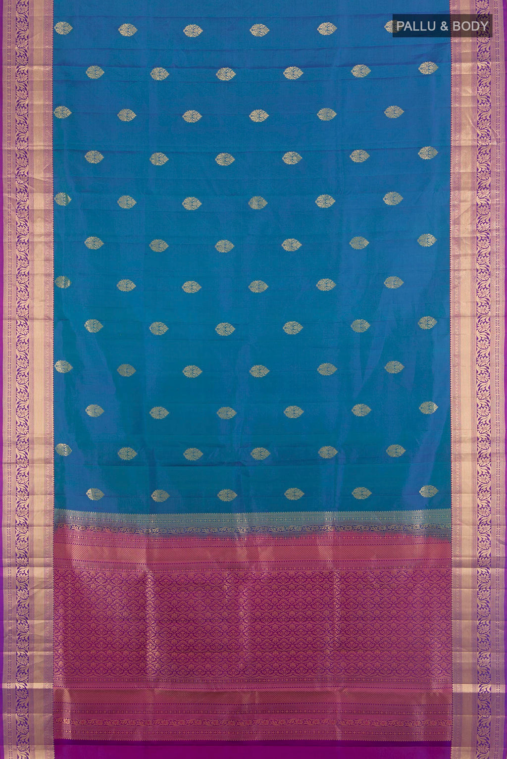 Flat view of Pure Silk Peacock Blue Soft Saree with Zari Butta on the body and Zari Border. 