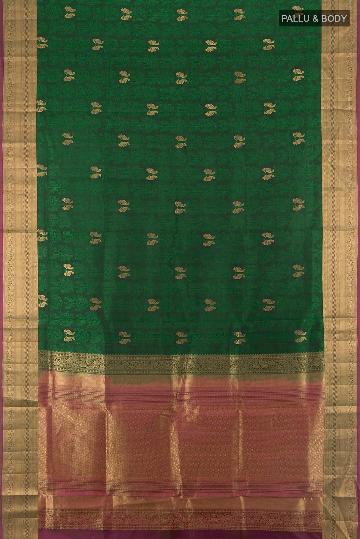 Flat view of Pure Silk Bottle Green Soft Saree with Jacquard With Zari Butta on the body and Zari Border. 